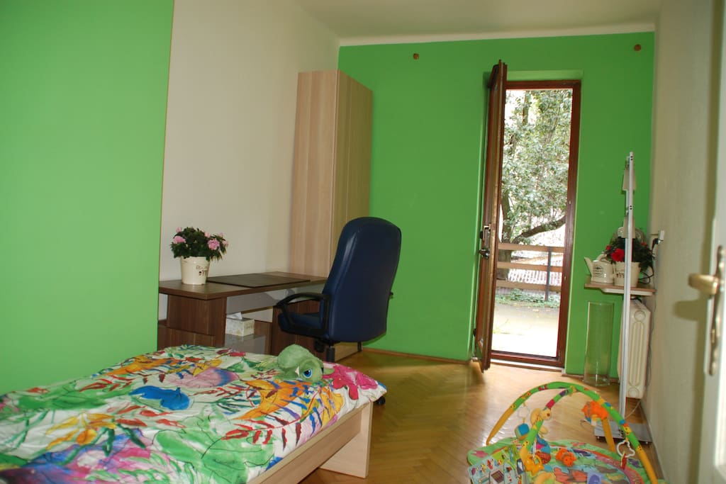 Small bedroom with large terrace and laptop friendly workspace