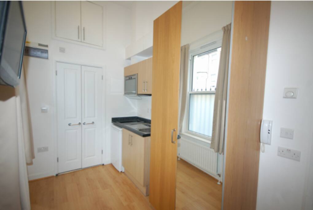 Kitchenette, Microwave Oven, Sink, Fridge/ Freezer, Large full length mirror