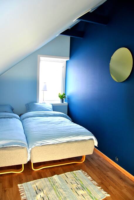 The room has two single beds that can be seperated
