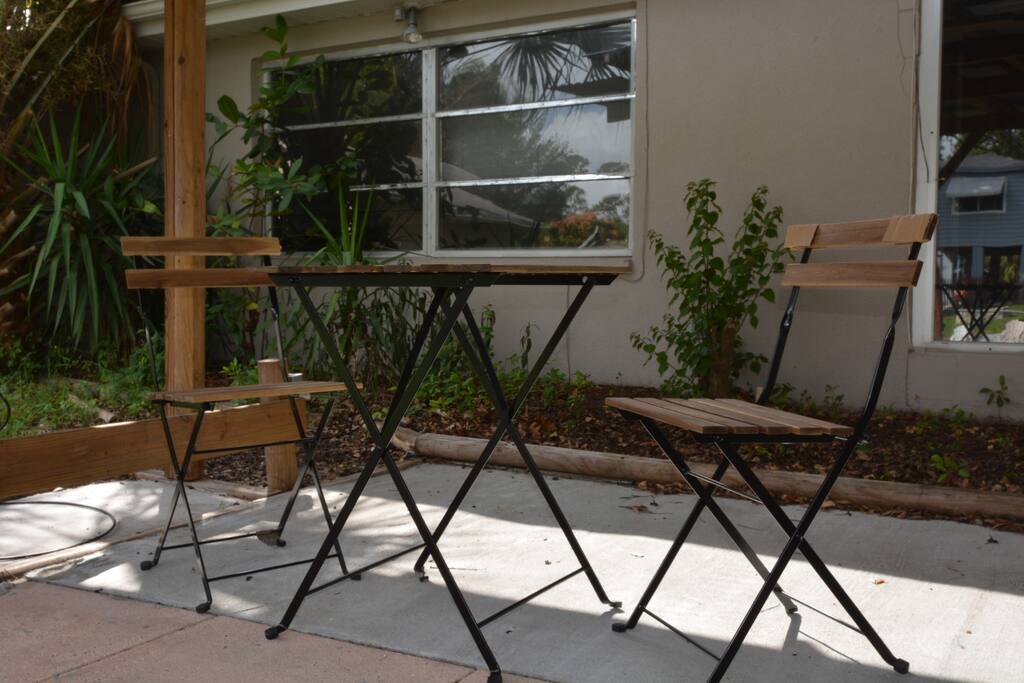 Enjoy some morning coffee here, looking at the back yard in front of water.