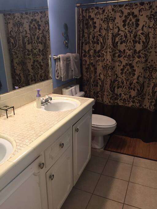 One of two full bathrooms.