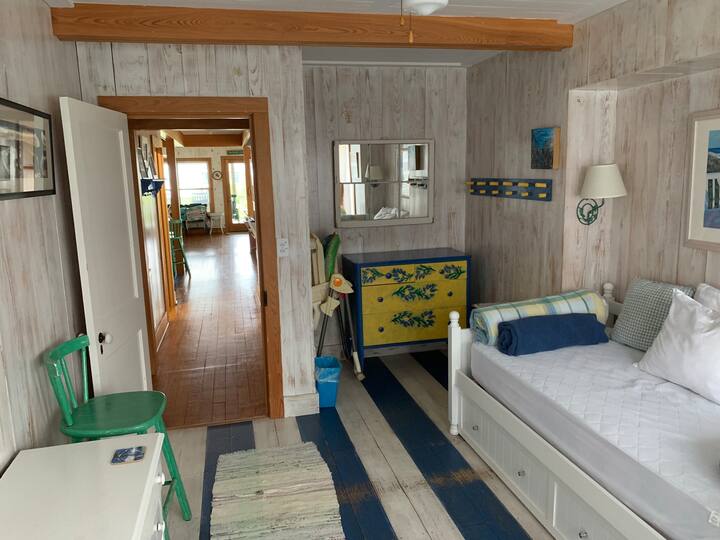 First floor, guest bedroom with twin bed and trundle underneath