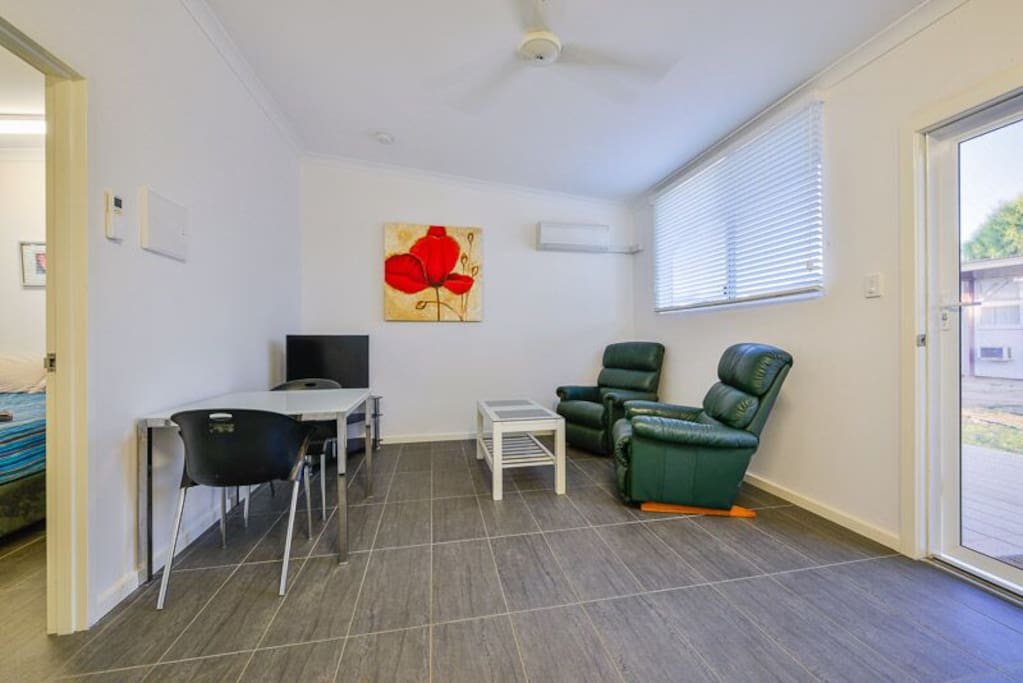 Living Room. Comfortable chairs.
Smart TV