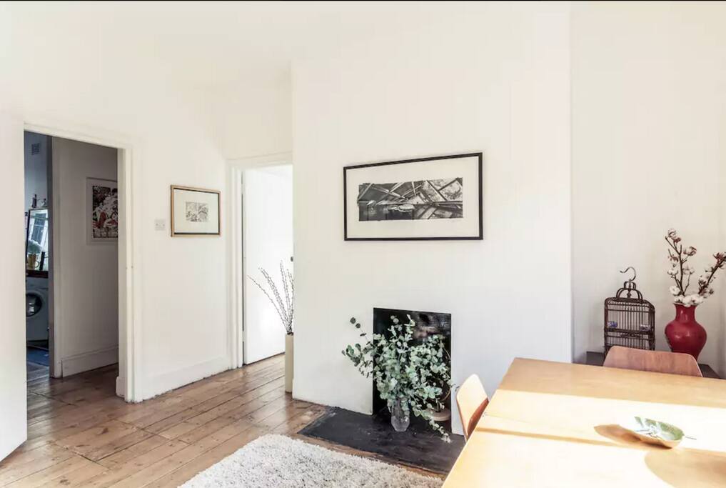 Living room with original fireplace