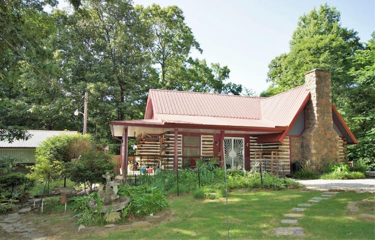 Quite , secluded four bedroom cabin on 6.5 acres.