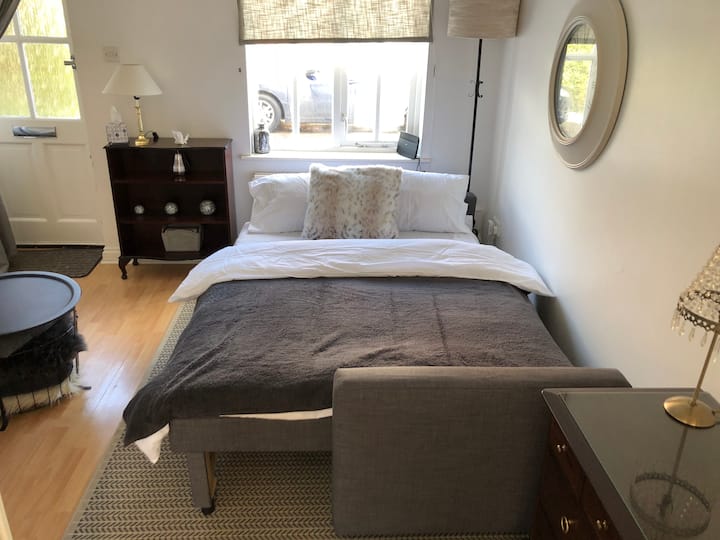 Double sofa bed in living room. 
