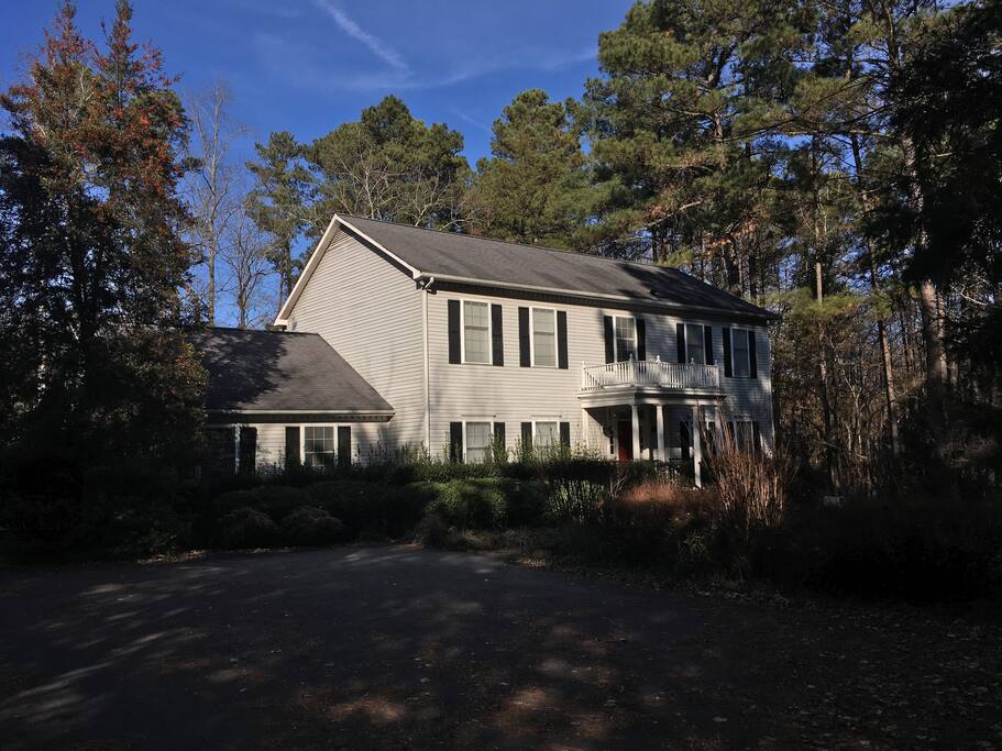 The Cowbell Inn is a Southern Colonial style home set on 4.5 wooded acres.
