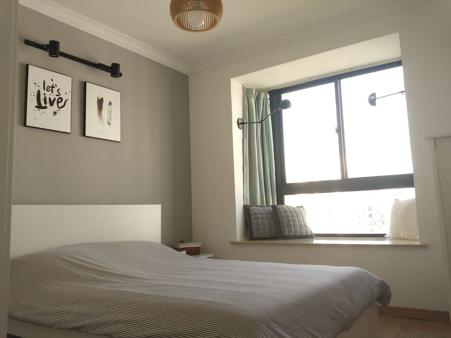 Large private bedroom with window bed
