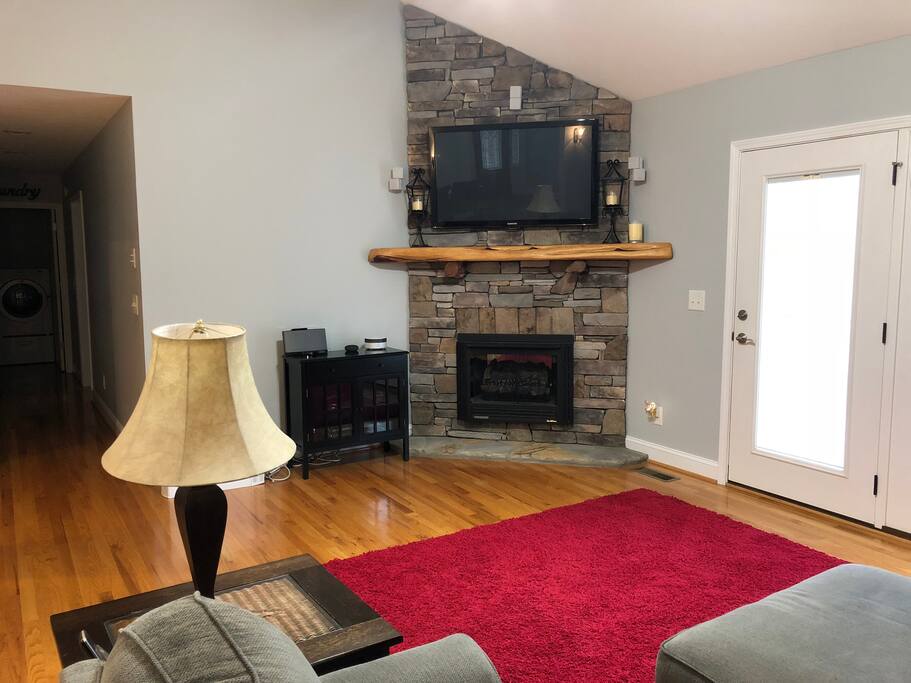 Living room with fireplace and flat screen tv with surround sound