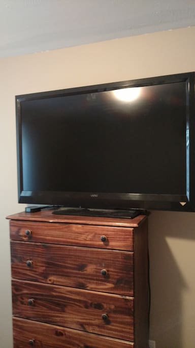 TV and Roku in bedroom for use