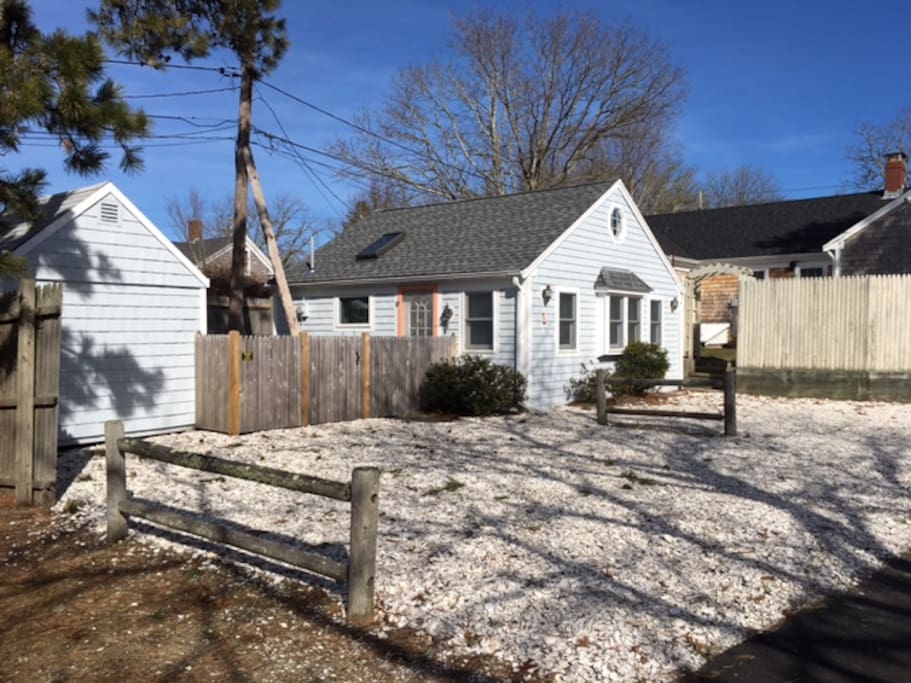 Such a pretty day when this photo was taken. Cottage was freshly painted with new shell parking area.
