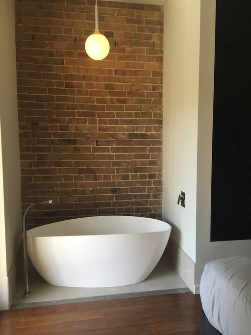 Main bedroom with freestanding bath