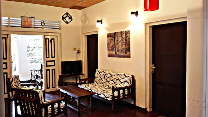 cozy cottage living area with satellite  TV . tangalle hotels sri lanka