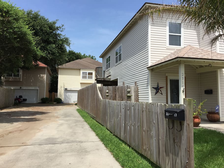 Shared driveway Pier Pleasure on right. Additional parking in front of house.