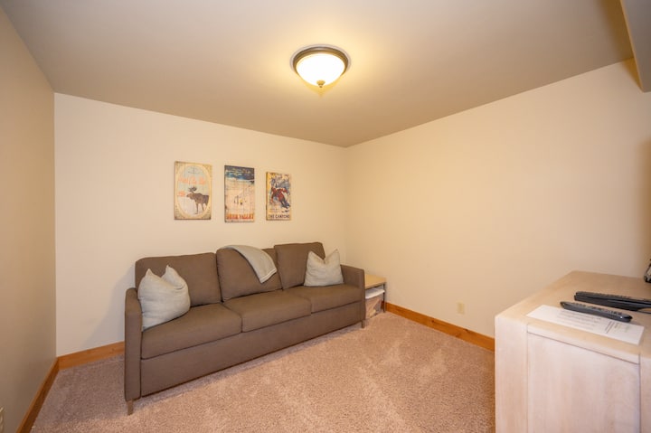 Sala TV con lavanderia