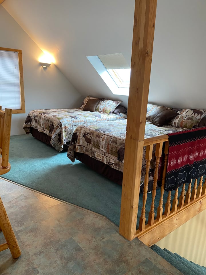 Due letti queen-size nel loft.