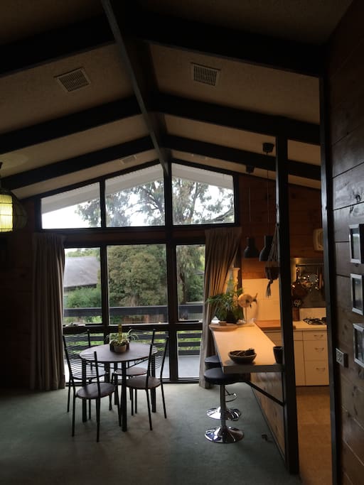 Tree top and filtered water views from open plan upstairs living