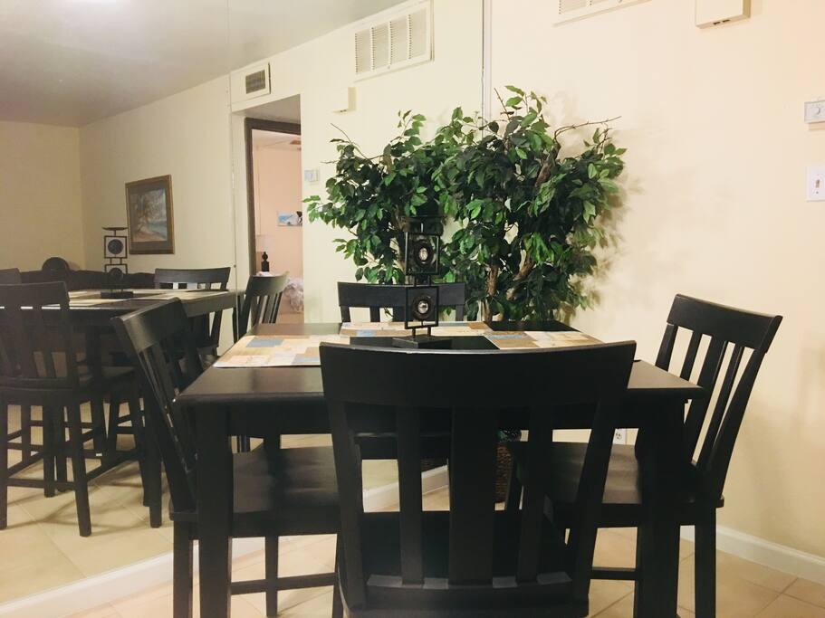 The dining table seats 4 comfortably and doubles as a great works pace.