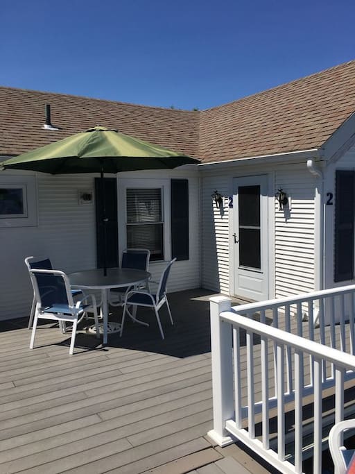 Located on upper deck with town and water view