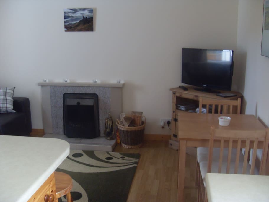 Sitting room with cosy open fire