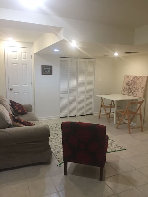 Living Room - table folds out to accommodate 4-6 chairs