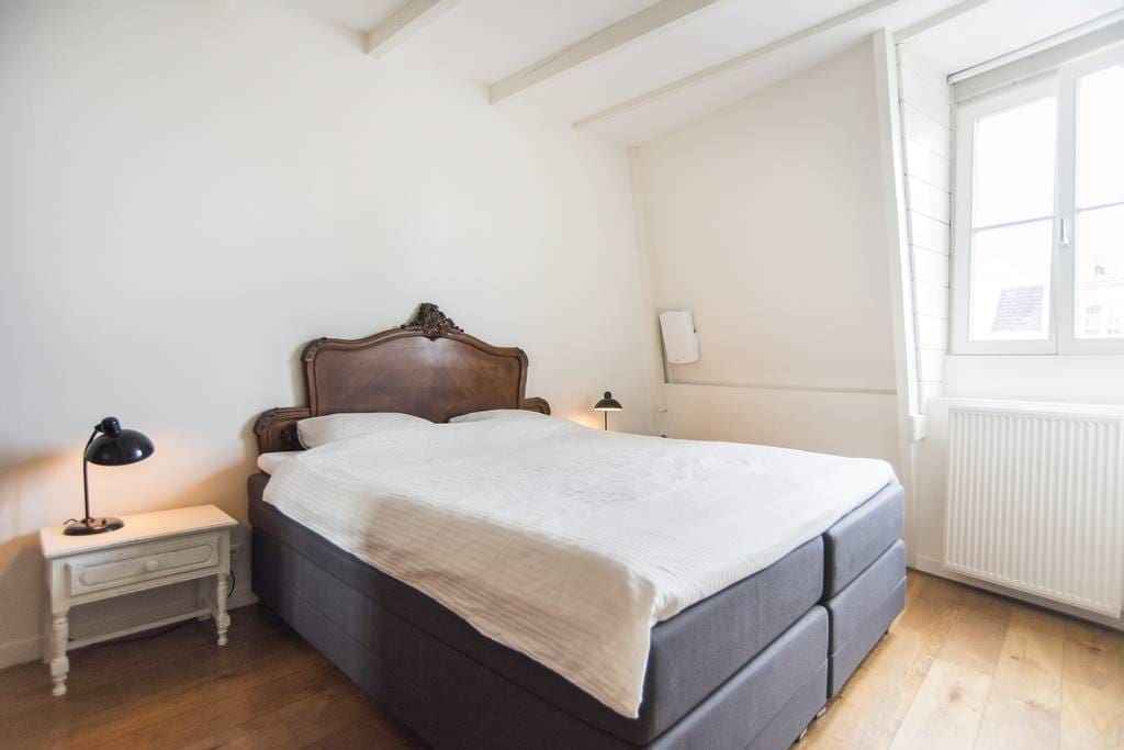 Quick view: Master bedroom with a large 220x200 box-spring double bed (and a 2-person mattress topper). Room also features filtered air refresher.