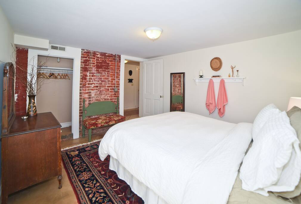 Exposed brick, antiques and lots of light-filled space in this retreat.
