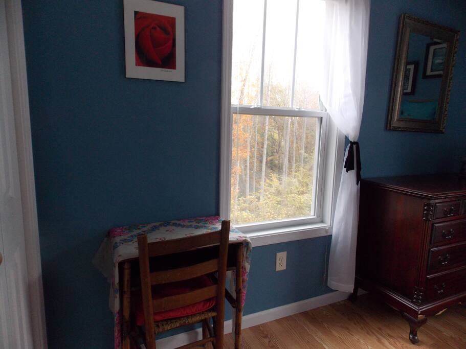 Laptop desk, facing treehouse window
