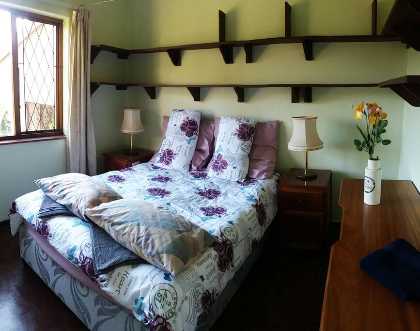 Bedside plug points both sides with adapters for easy changing mobile and plug in hair dryer.