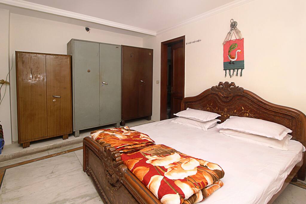spacious Room view with 3 wardrobes and lots of space.