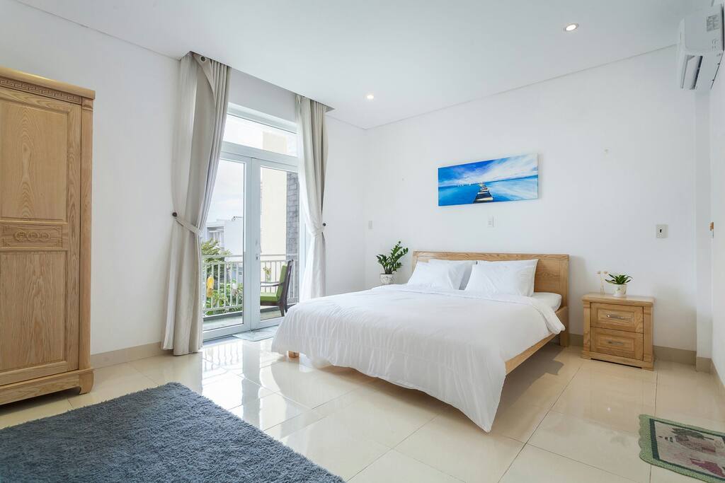 Bedroom #1 with balcony, private bathroom.