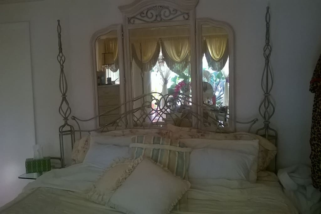 Master bedroom with view of Pergola and Waterway, King bed, luxury pillow top mattress