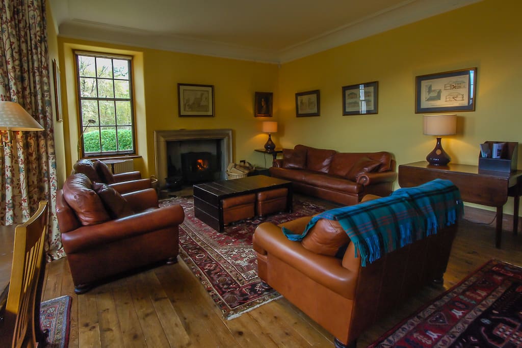 The comfortable sitting room with wood burning stove.
