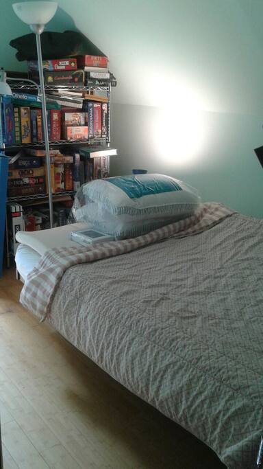 Full size futon with memory foam topper.