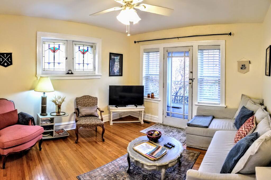 Living Room: Plenty of seating and access to small patio balcony