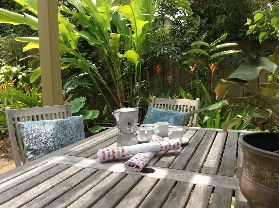Enjoy breakfast or just relax in the tranquil tropical gardens