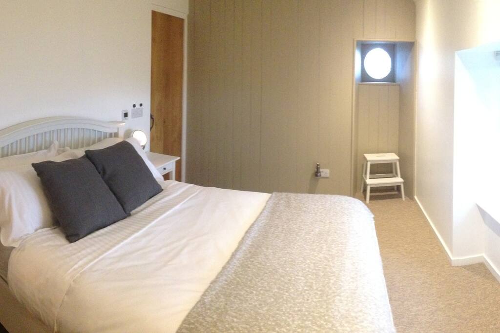 Bedroom 2 with porthole and en-suite