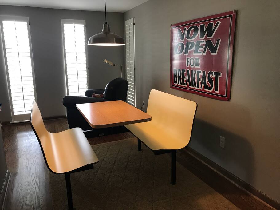 Retro vibe & a cozy swivel club chair for reading or napping...