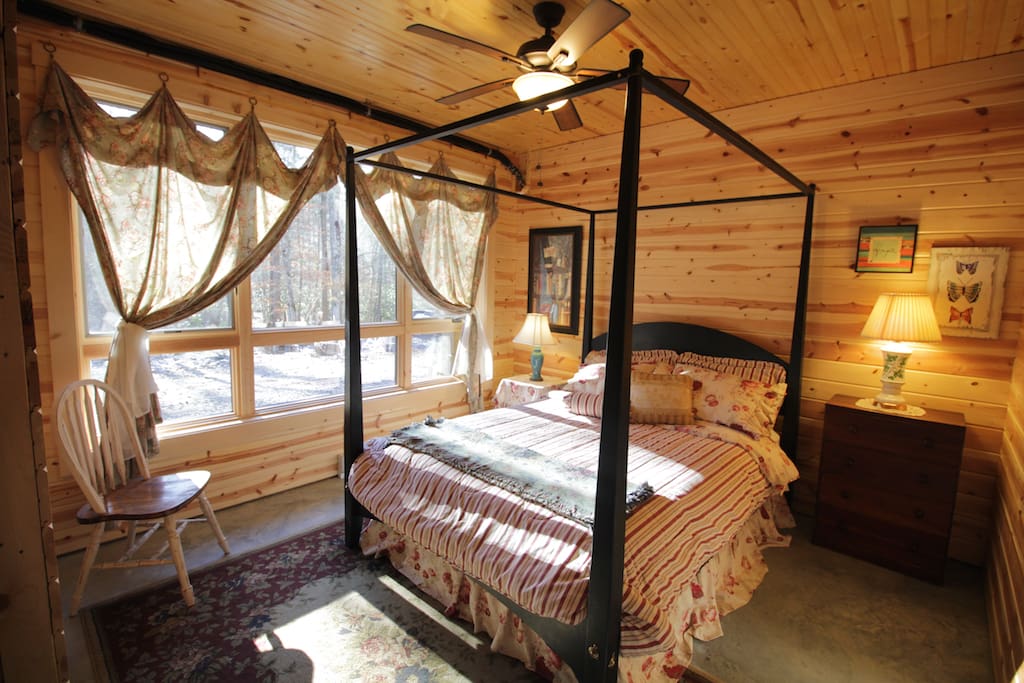 The queen canopy poster bed in the 2nd room.