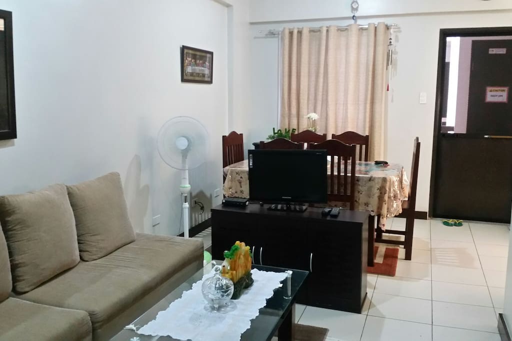 living room and dining room. TV with digital box channels.