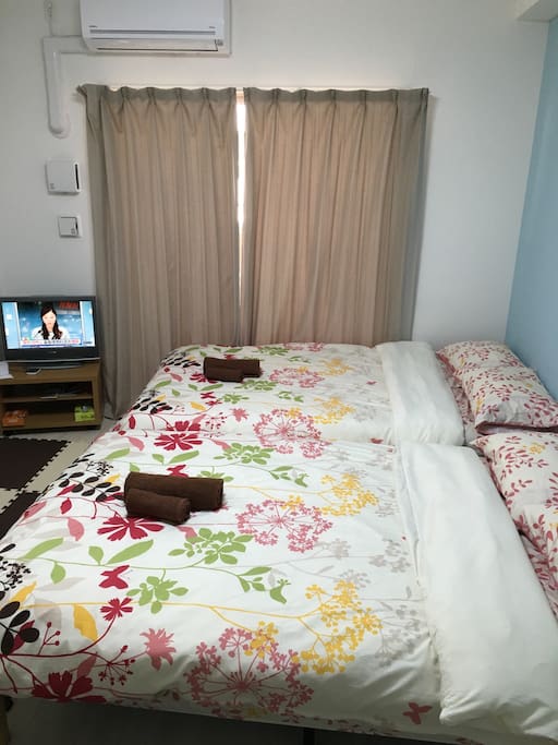 There is a TV in a room.