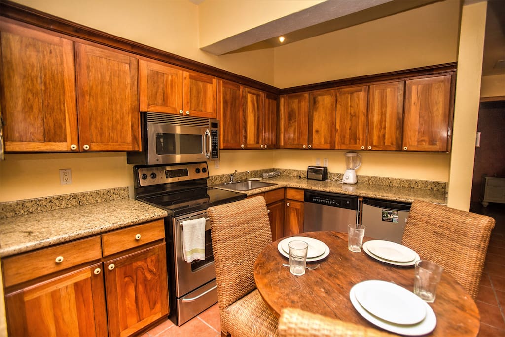 Beach Suite Kitchen - Granite counters, hand made cabinetry and all the accoutriments
