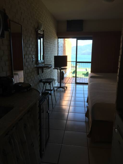 Flat com vista ao fundo mar