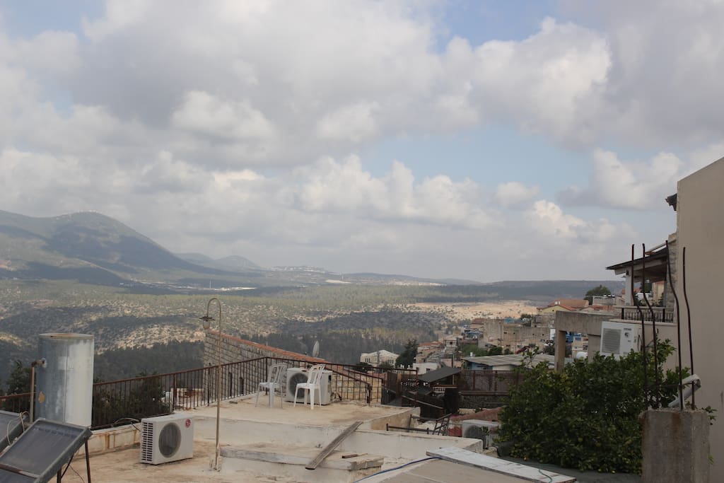 What other people have to see from climbing to their rooftops, you can see from the comfort of INN Tzfat's living room!
