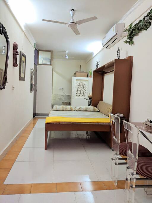 Wall mounted Murphy bed for more living space.