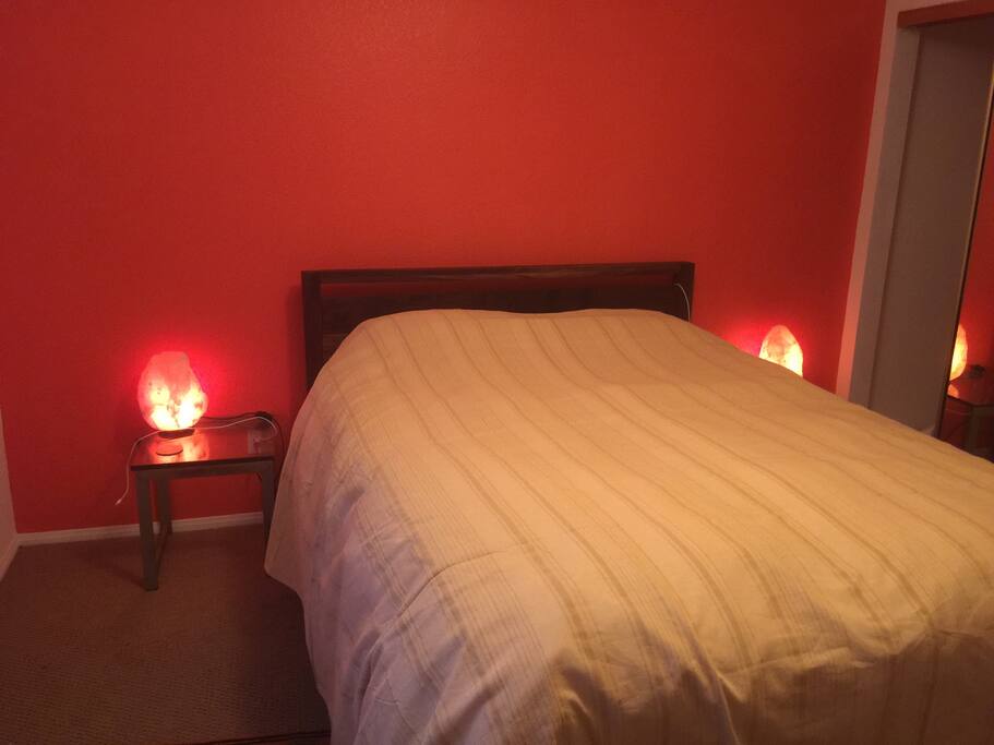 Orange bedroom with Queen bed