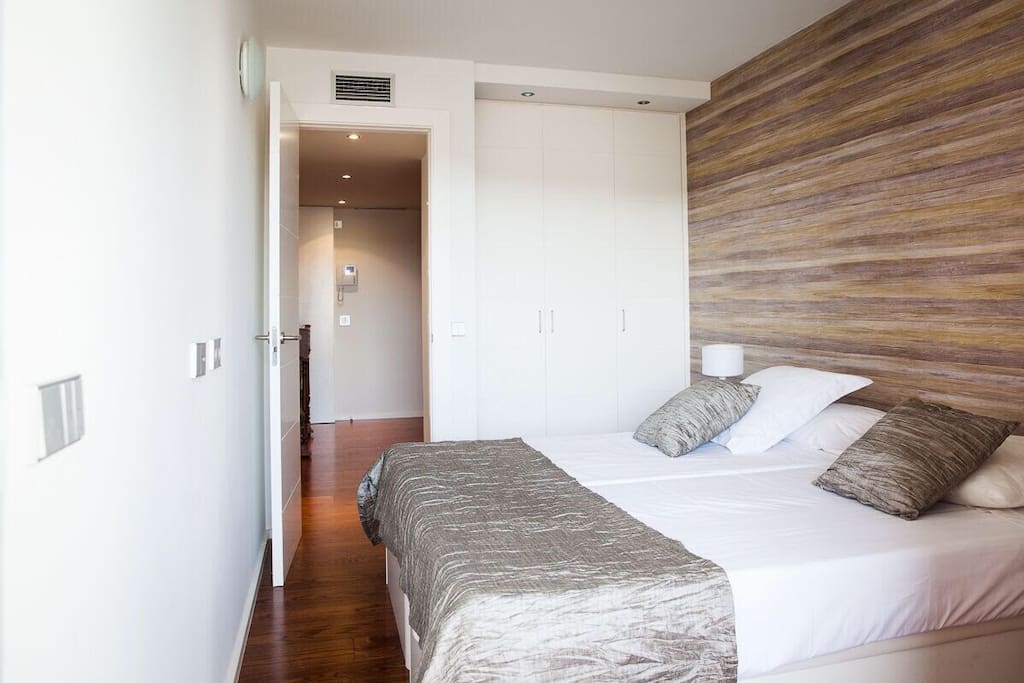 Bedroom with view of apartment entry