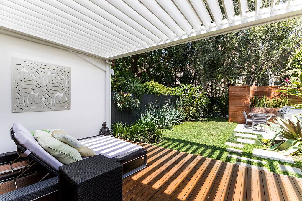 Relax on the day bed. Roof can open or close to suit the weather.