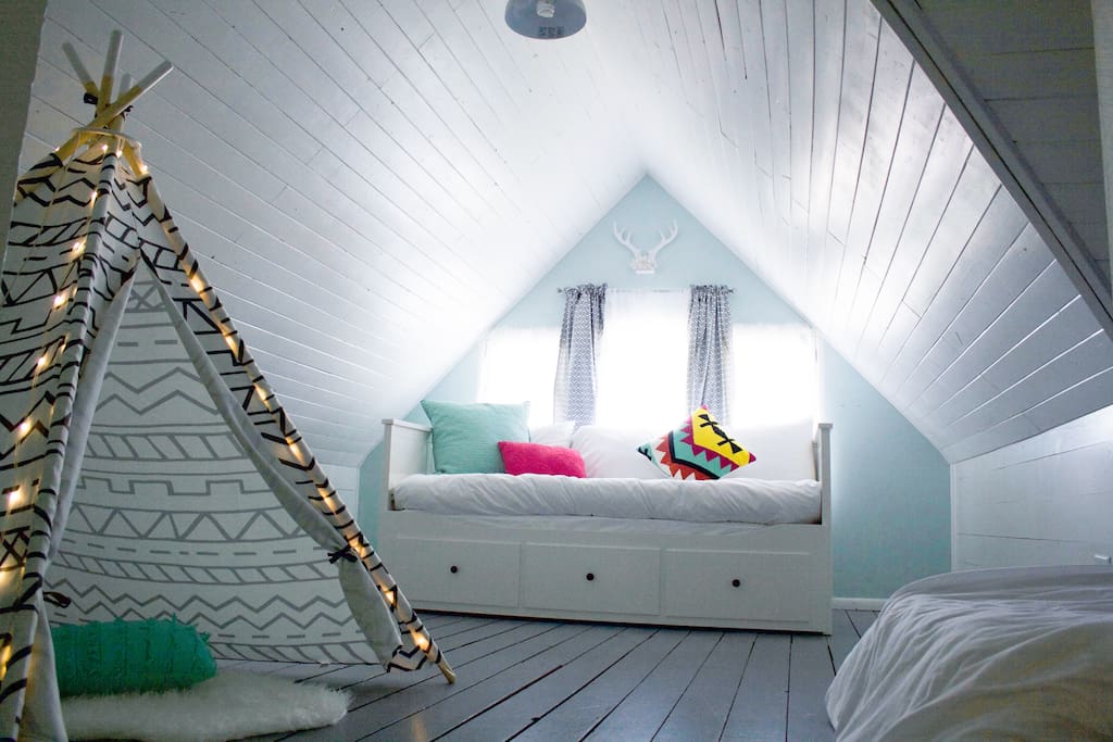 House #1, Bedroom #1 - Whimsical attic bedroom with twin daybed (converts to queen) and 2nd twin memory foam mattress.