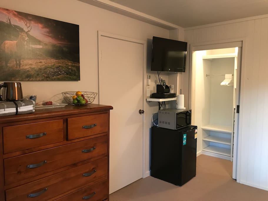 TV with Foxtel, Wi-Fi, Fridge, Microwave, Kettle, Coffee-tea, biscuits and Fruits.
